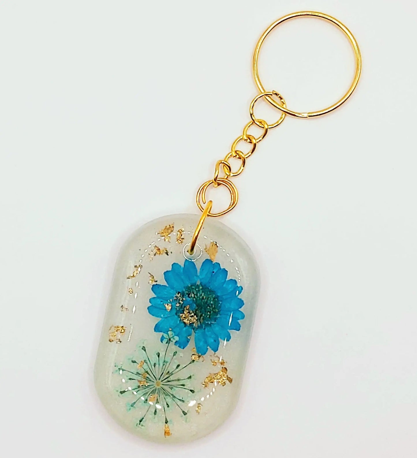 Porte-clés Fleurs séchées bleues en résine époxy