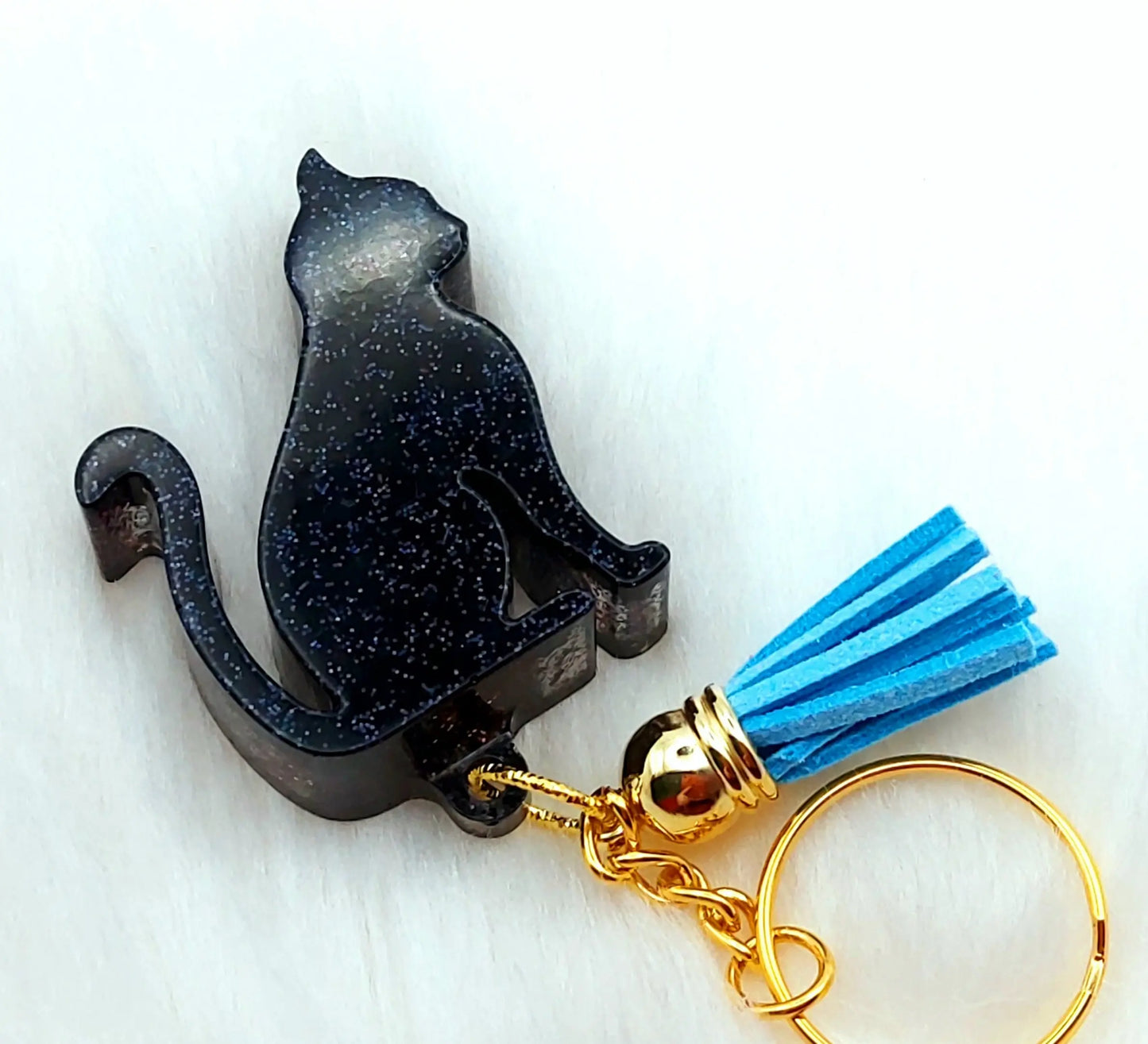 Porte-clés CHAT ASSIS en résine époxy. Noir pailleté