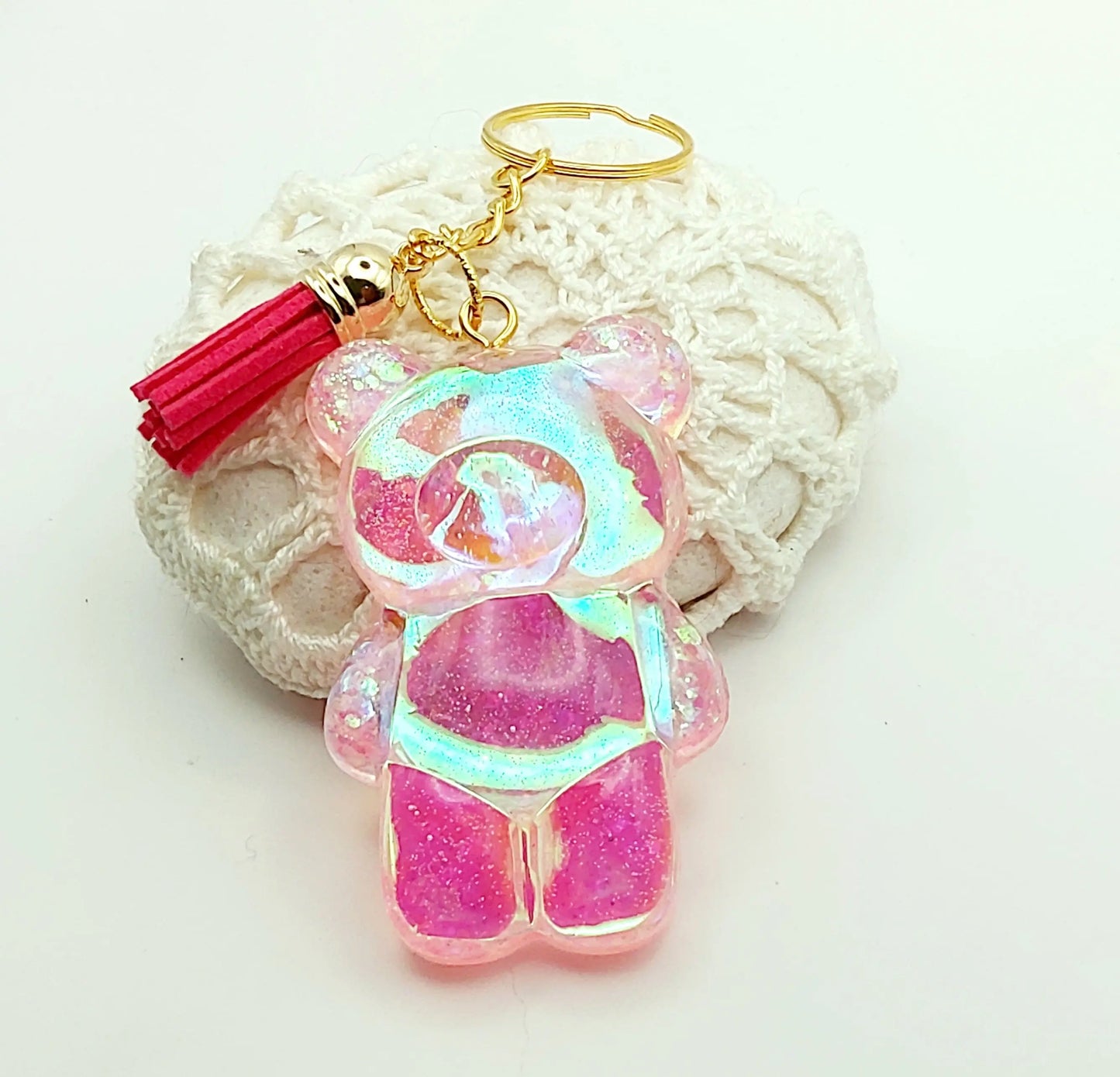 Porte-clés "Gros Ours" en résine époxy, holographique rose, pompon gland fuchsia