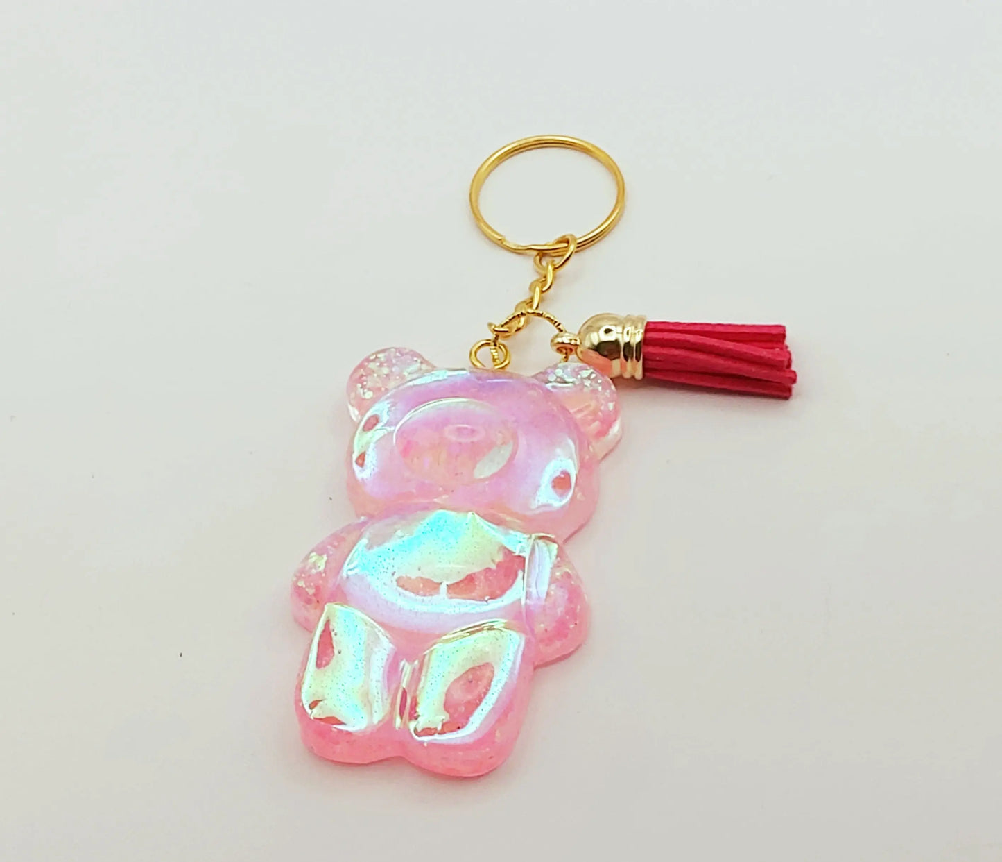 Porte-clés "Gros Ours" , holographique rose, pompon gland fuchsia
