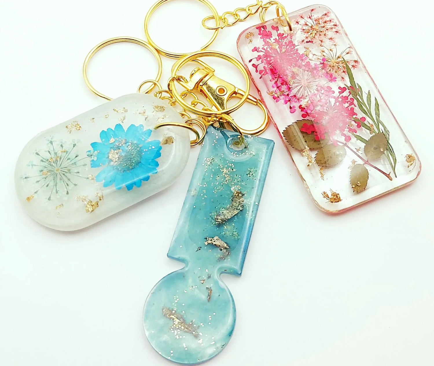 Porte-clés divers avec fleurs séchées et feuilles d'or - PRETTY RESINE