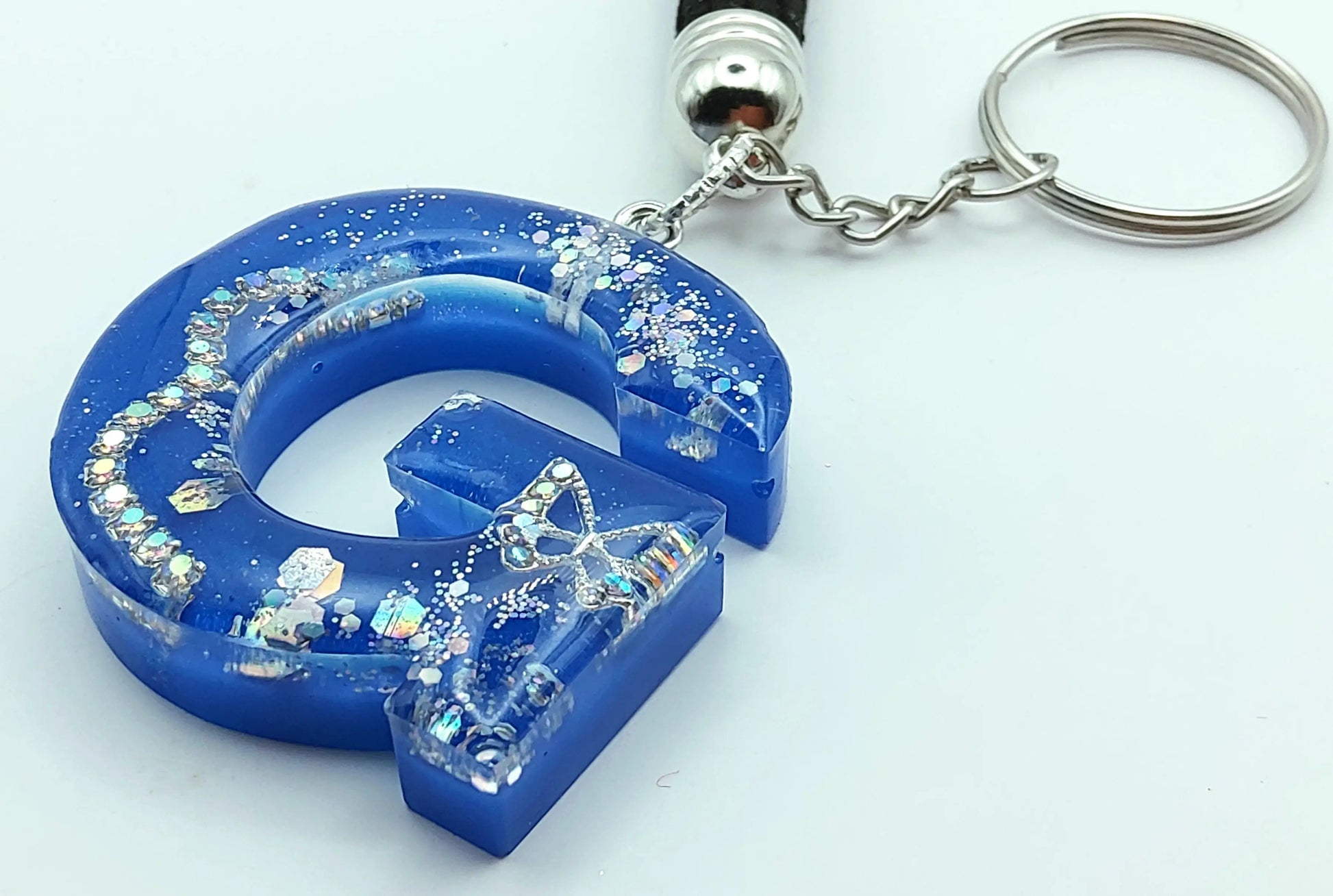 Porte-clés LETTRE G en résine époxy. Bleu et argent