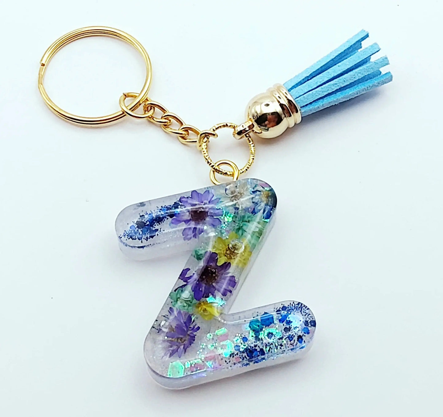 Porte-clés "Petite Lettre Z" en résine époxy, fleurs, paillettes et pompon gland bleus