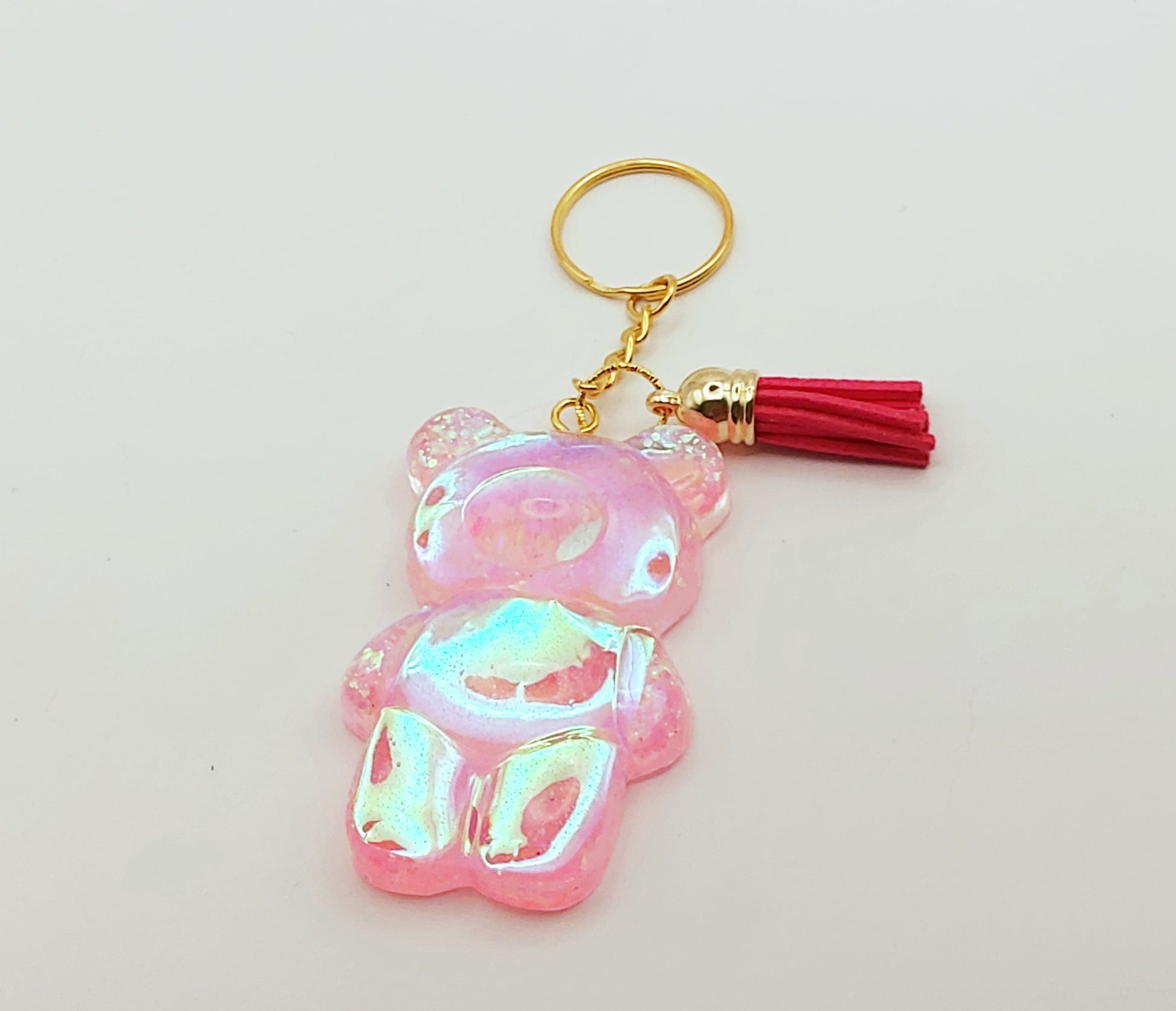 Porte-clés "Gros Ours" , holographique rose, pompon gland fuchsia 