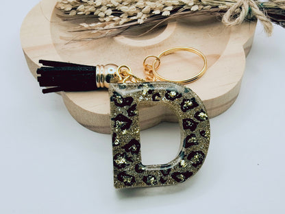 Porte-clés Lettre D en résine époxy. Motif léopard et feuille d'or - PRETTY RESINE