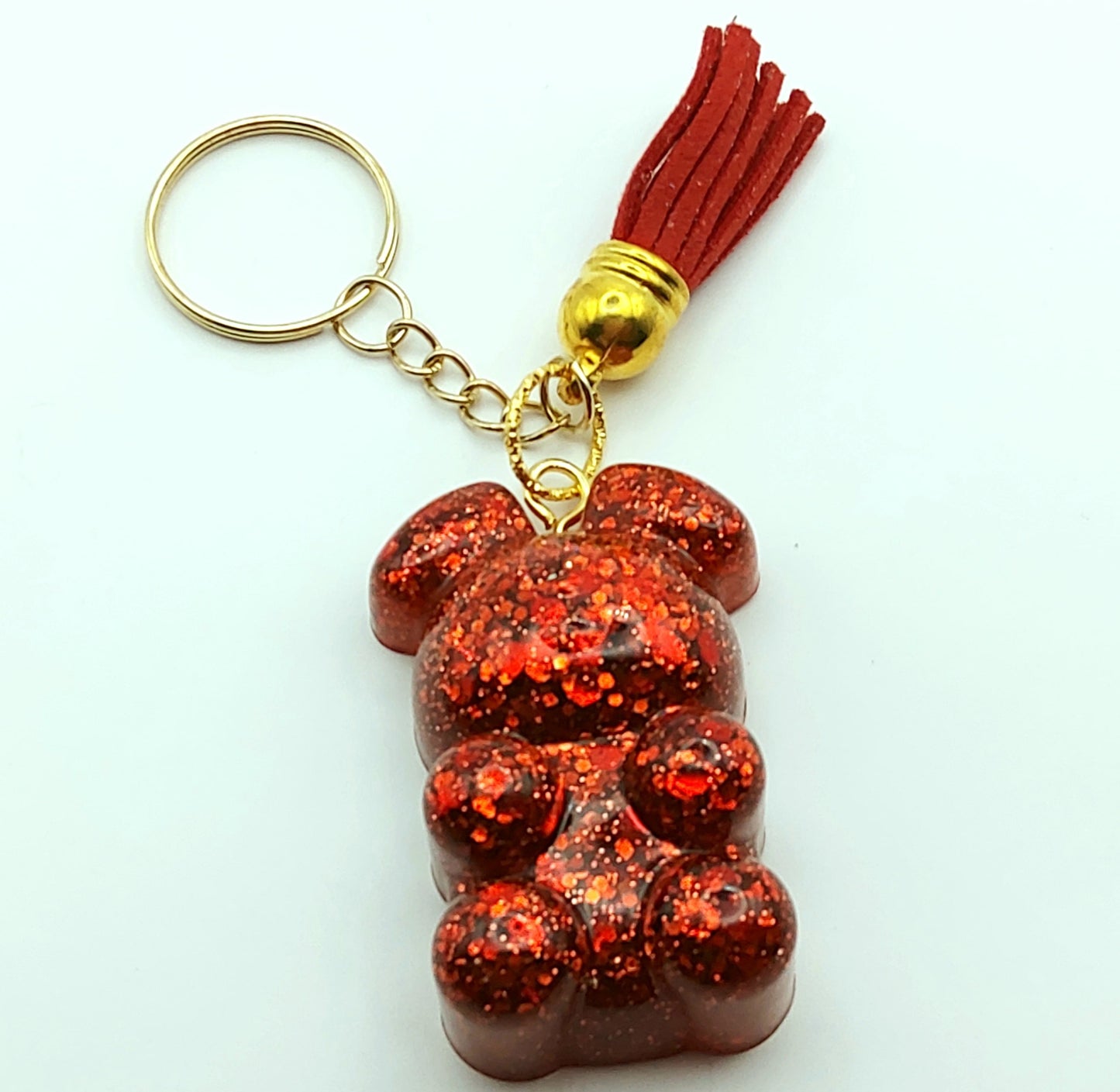 Porte-clés "Ourson debout" en résine époxy, paillettes rouges, pompon gland rouge, anneau doré.